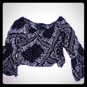 Off the shoulder flowy bohemian style top.